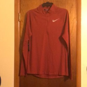 Nike Burnt orange top (OLCC)